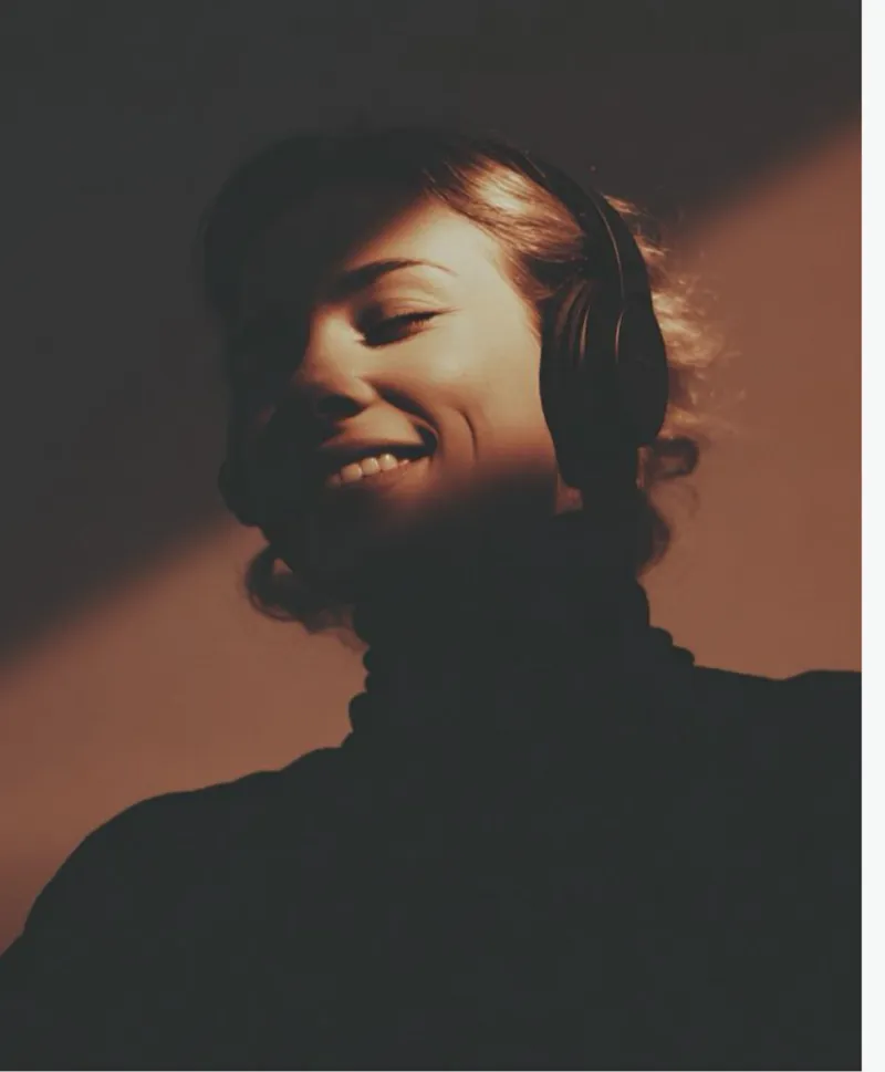 Woman listening to music with eyes closed